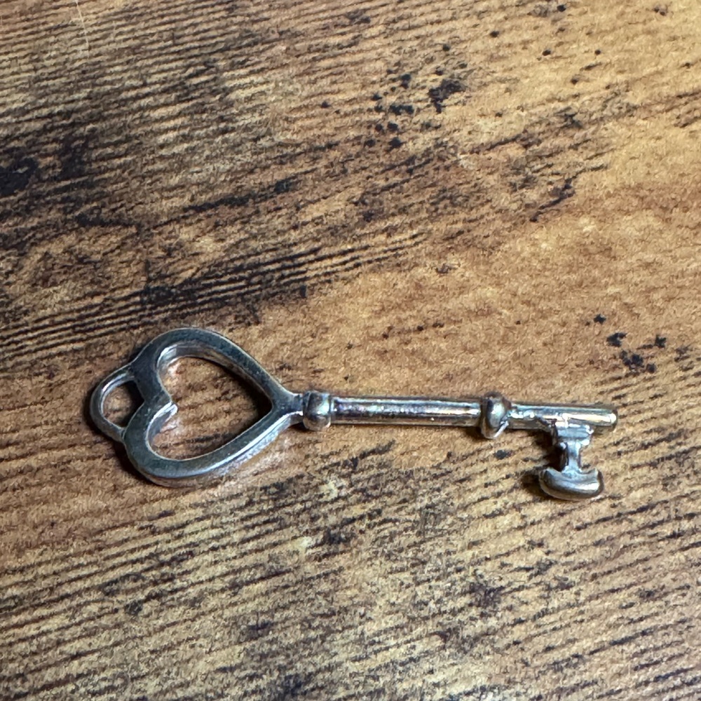 Tiffany & Co Heart Shaped Sterling Silver Key Pendant